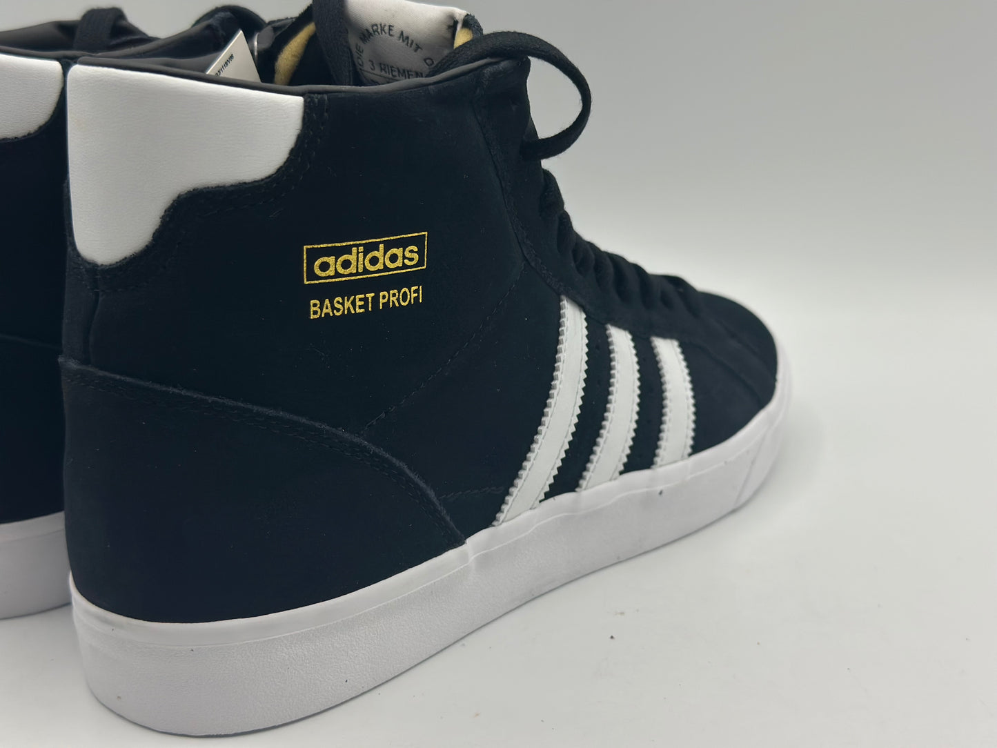 ADIDAS ORIGINALS
Baskets Montantes Profi Core Black Footwear White Gold Metal