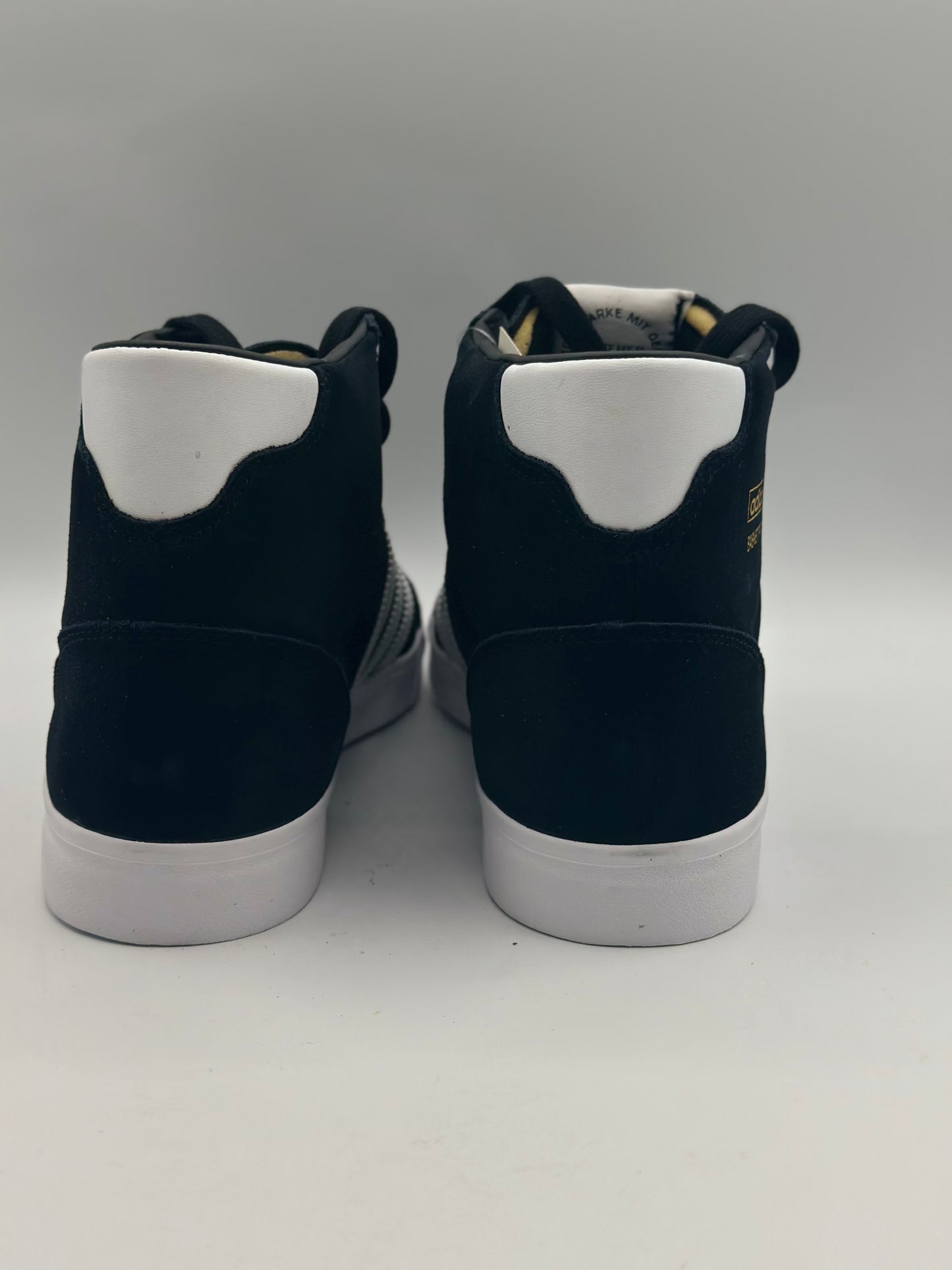 ADIDAS ORIGINALS
Baskets Montantes Profi Core Black Footwear White Gold Metal