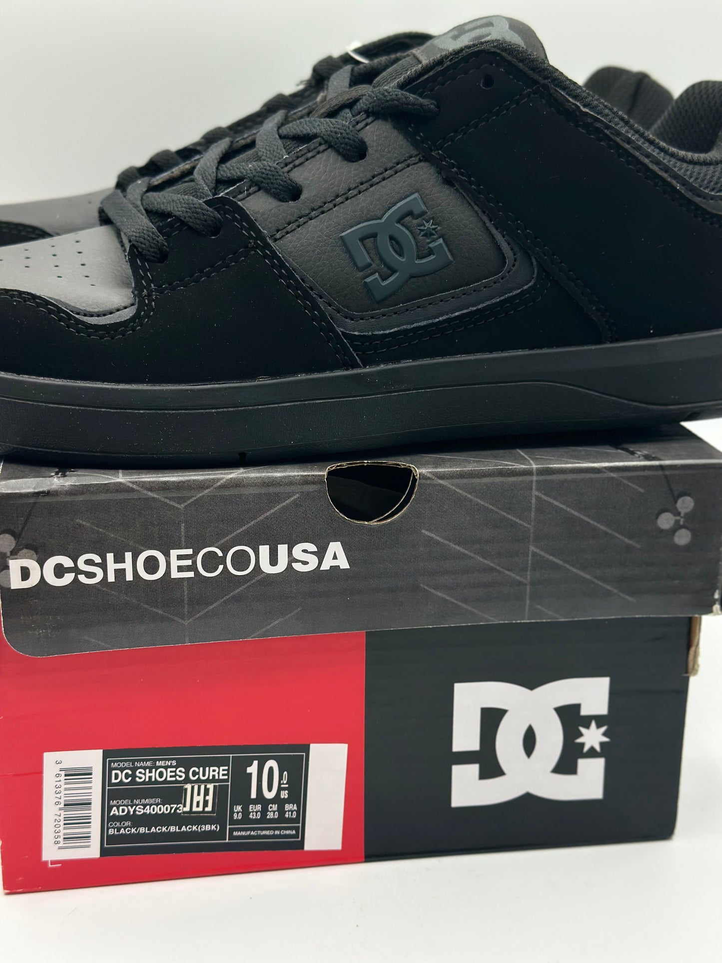 DC Cure - Chaussures de skate en cuir pour Homme