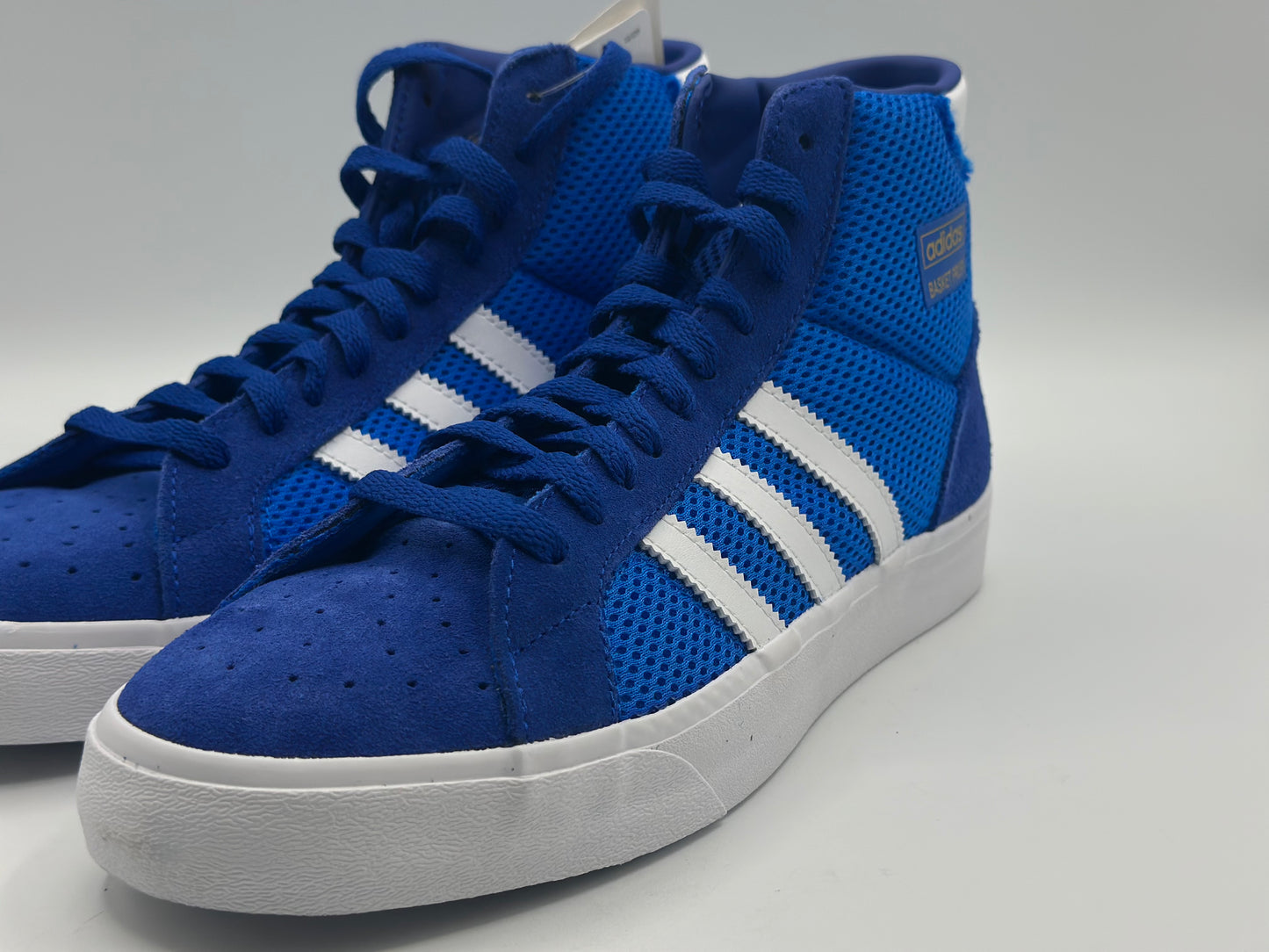 ADIDAS ORIGINALS
Baskets Montantes Profi Core Black Footwear White Gold Metal