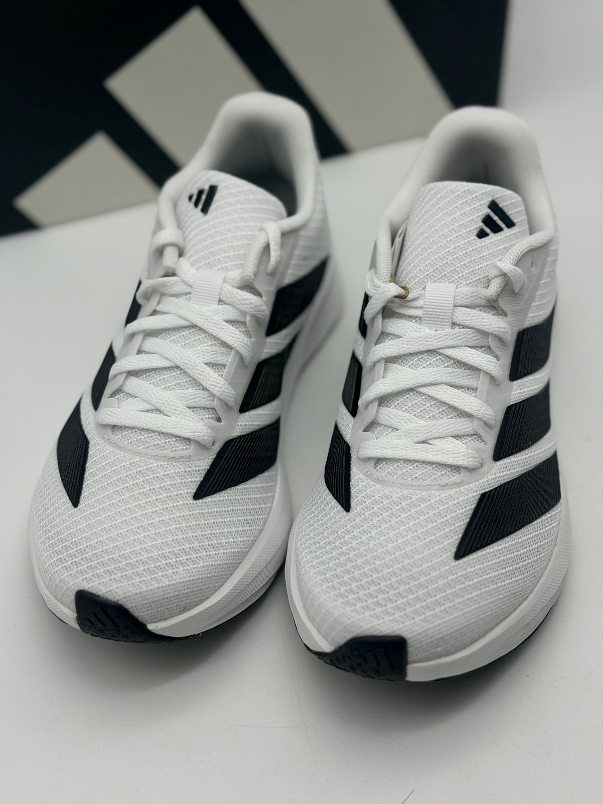 Chaussures de running Adidas blanches légères