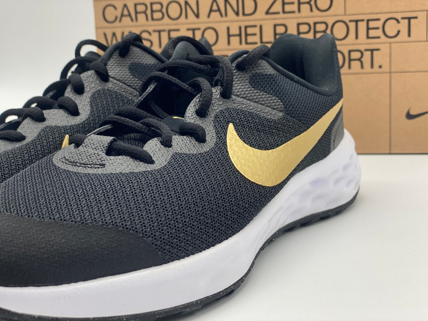 Baskets Nike Revolution 6 Next Nature noir / or enfant fille