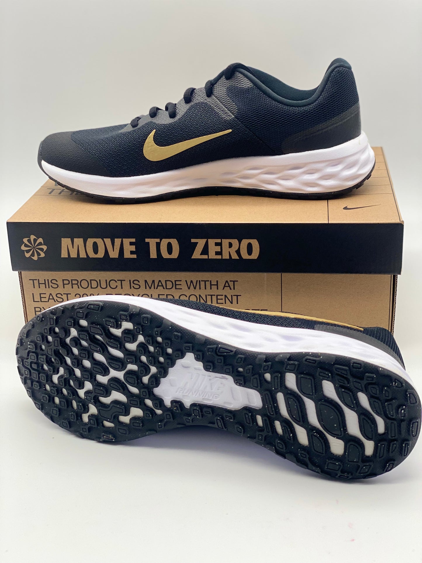 Baskets Nike Revolution 6 Next Nature noir / or enfant fille