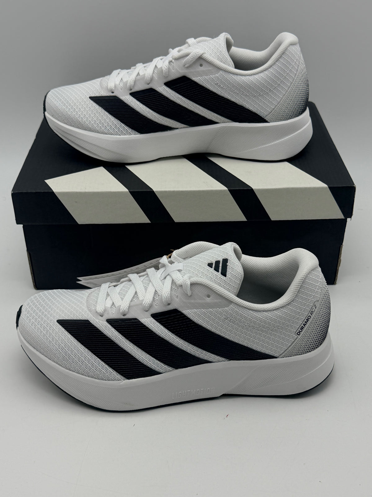 Chaussures de running Adidas blanches légères
