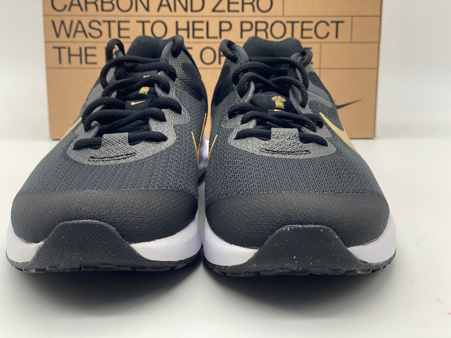 Baskets Nike Revolution 6 Next Nature noir / or enfant fille