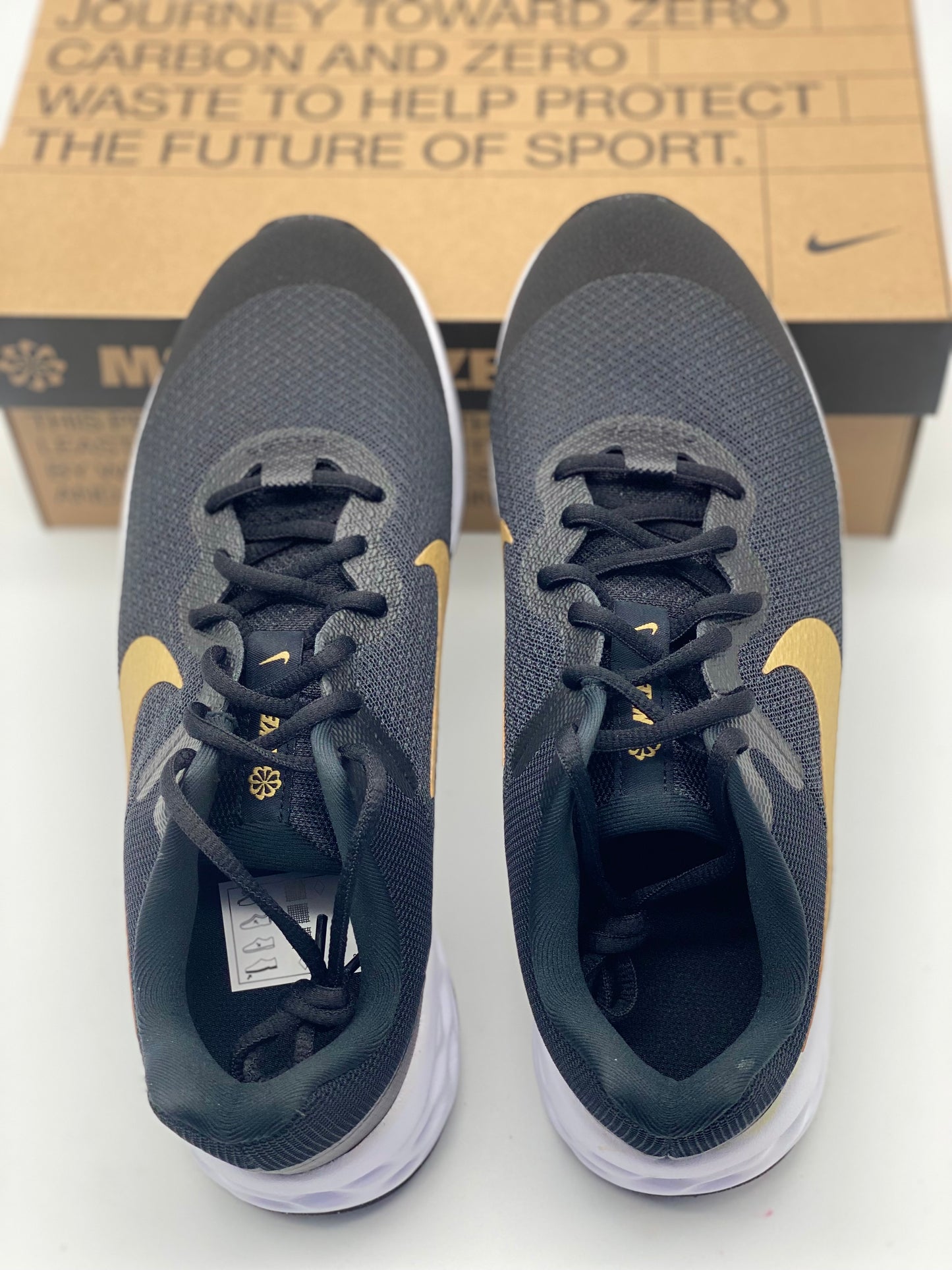 Baskets Nike Revolution 6 Next Nature noir / or enfant fille