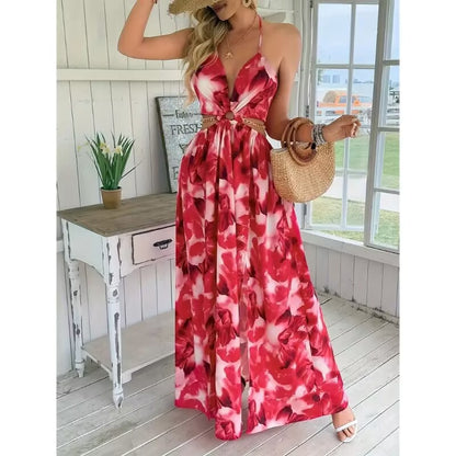 Robe "Flora-Chain" – Coupe Évasée, Dos Nu & Découpes Latérales avec Détail Chaîne
L'élégance florale sublimée par une touche d'audace